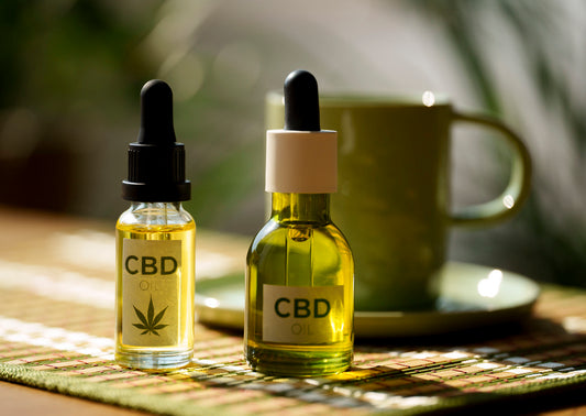 Two bottles of CBD oils